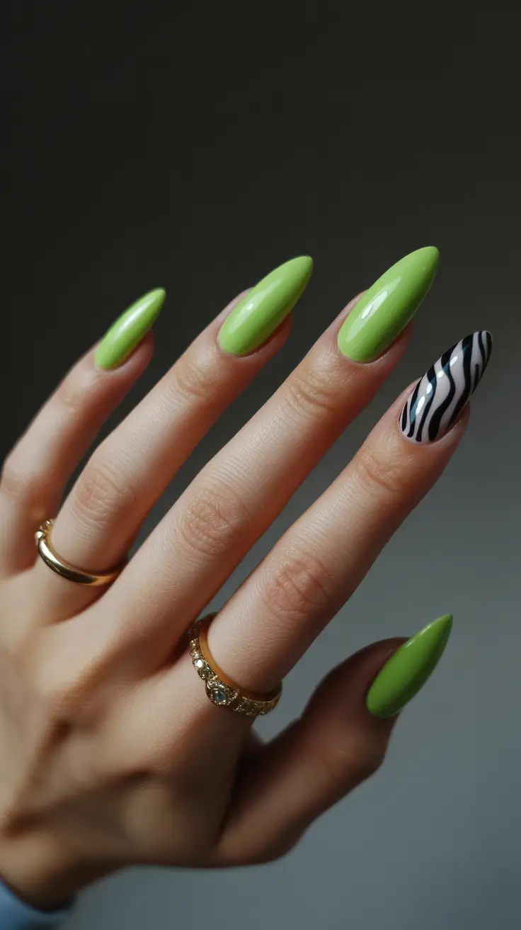 Lime green nails with zebra accent.