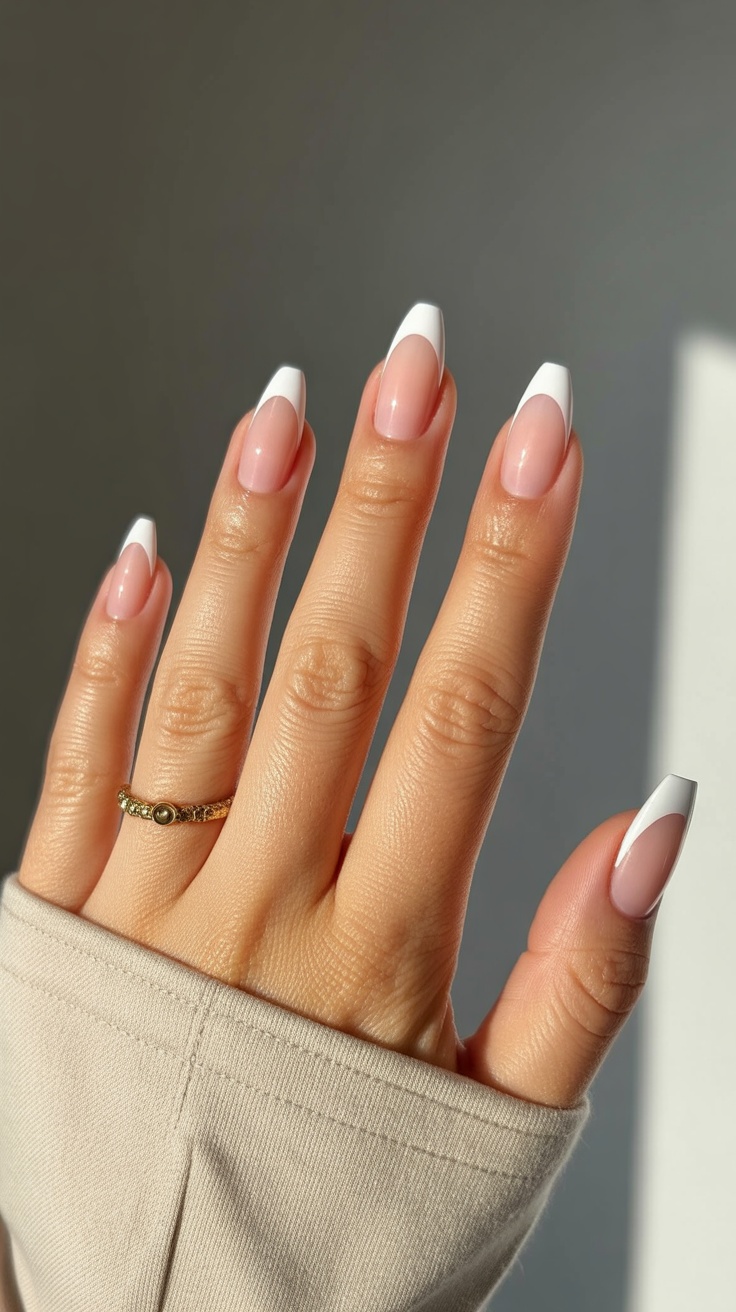 Elegant French manicure with white tips, classic nail art