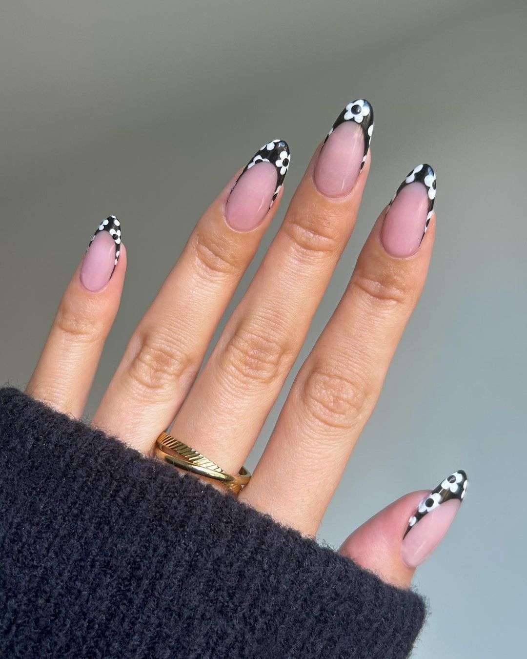 Black and white floral French tips, elegant and modern