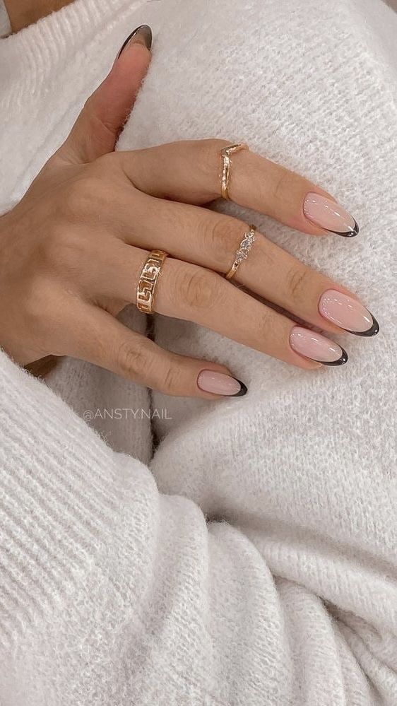 Black-tipped French manicure with nude base