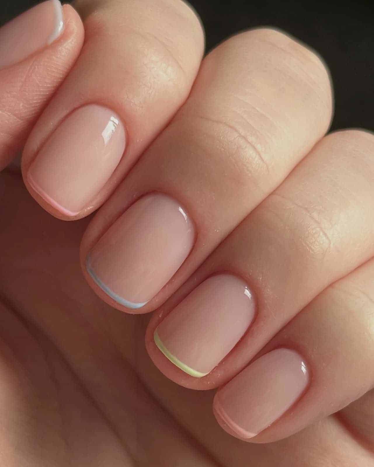 Pastel micro-French nails on natural base
