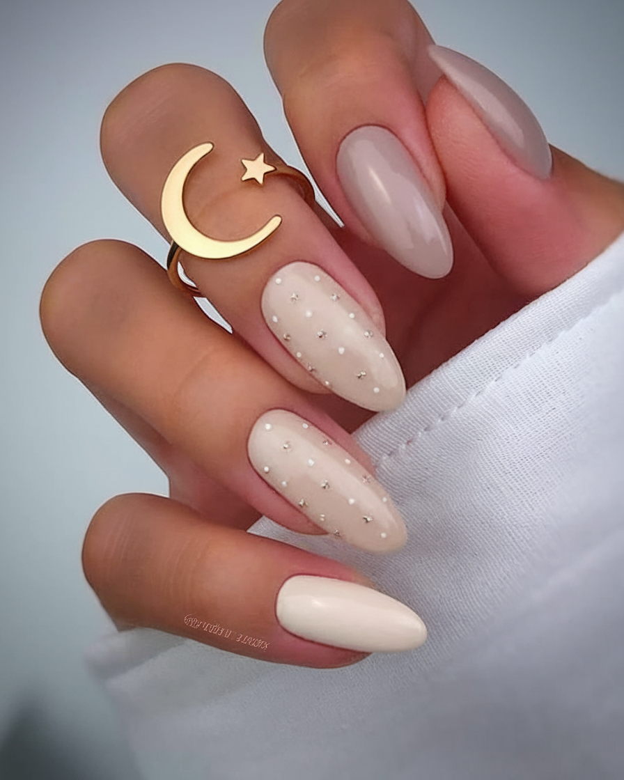 Minimalist nude nails with pearl embellishments
