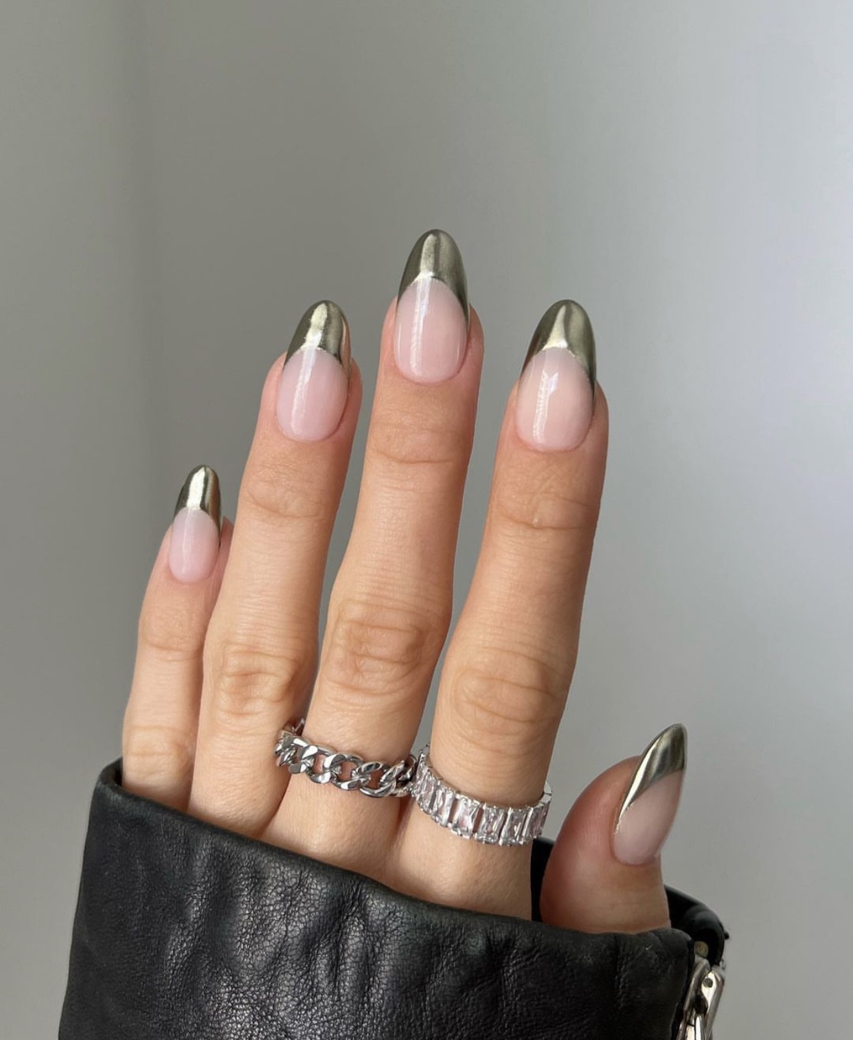 Metallic chrome French tips on almond nails