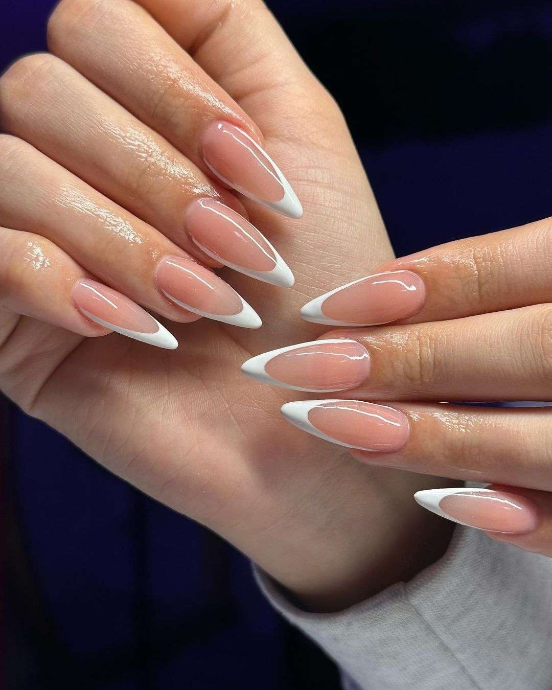 Classic stiletto French tips for elegance