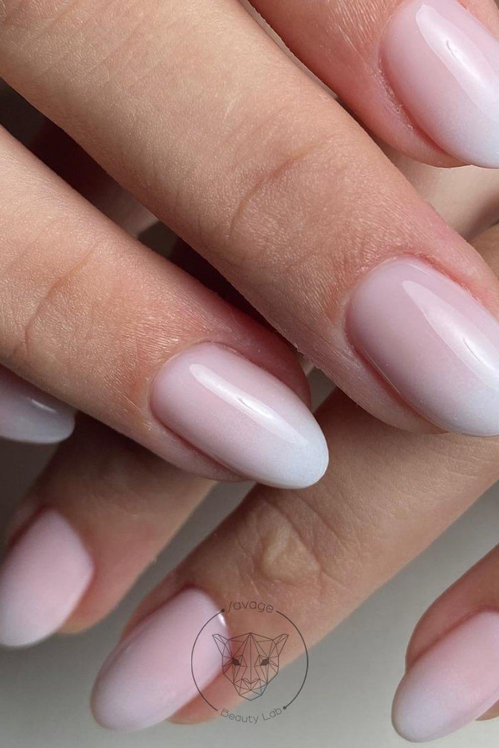 Soft pink ombre nails with glossy finish