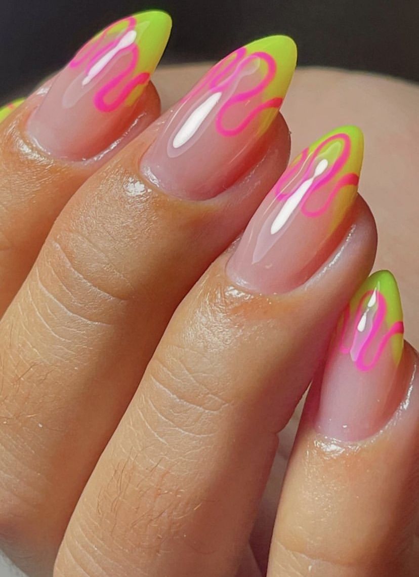 Neon flame French tips with almond shape, capturing bold nail art trends and vivid colors.