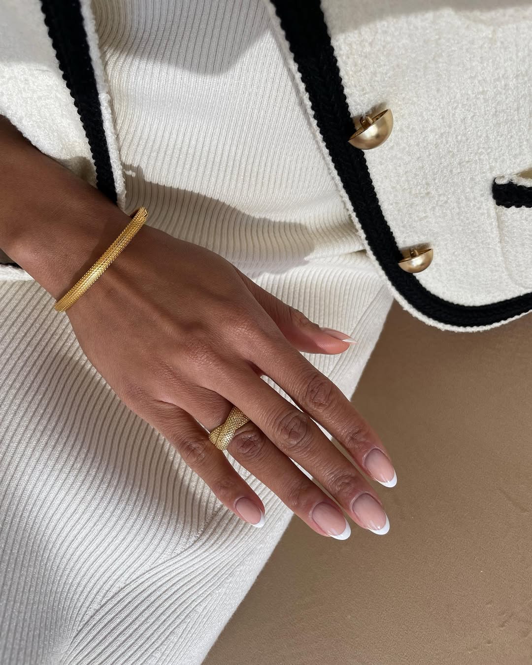 Classic French tips with a modern twist, timeless and chic.