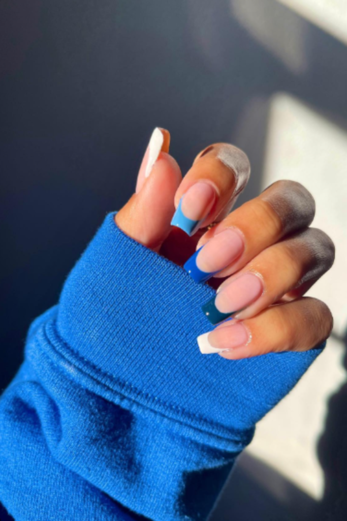 Color block French tips on square nails, vibrant and trendy.