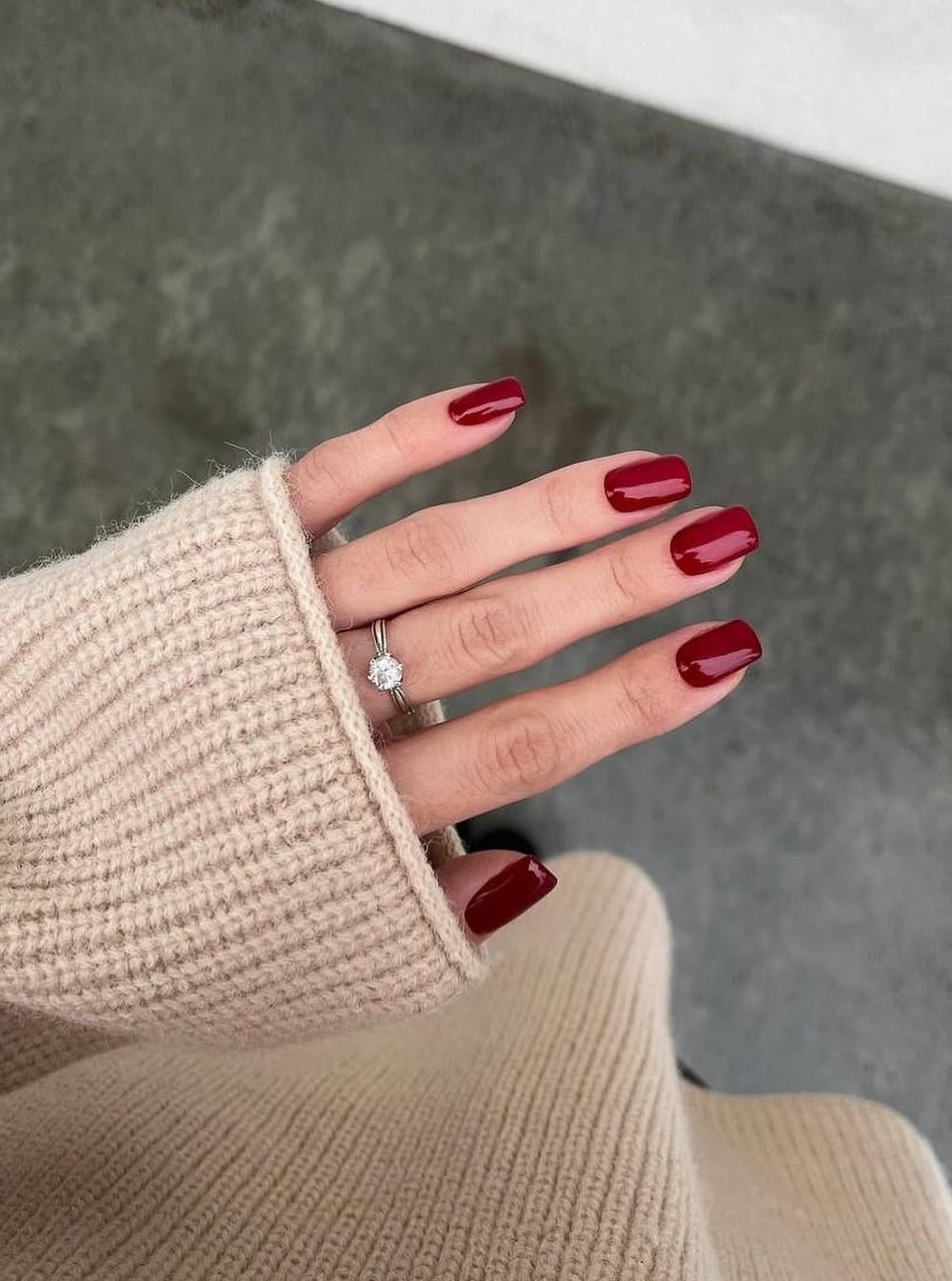 Deep red nails on square shape, classic and bold.