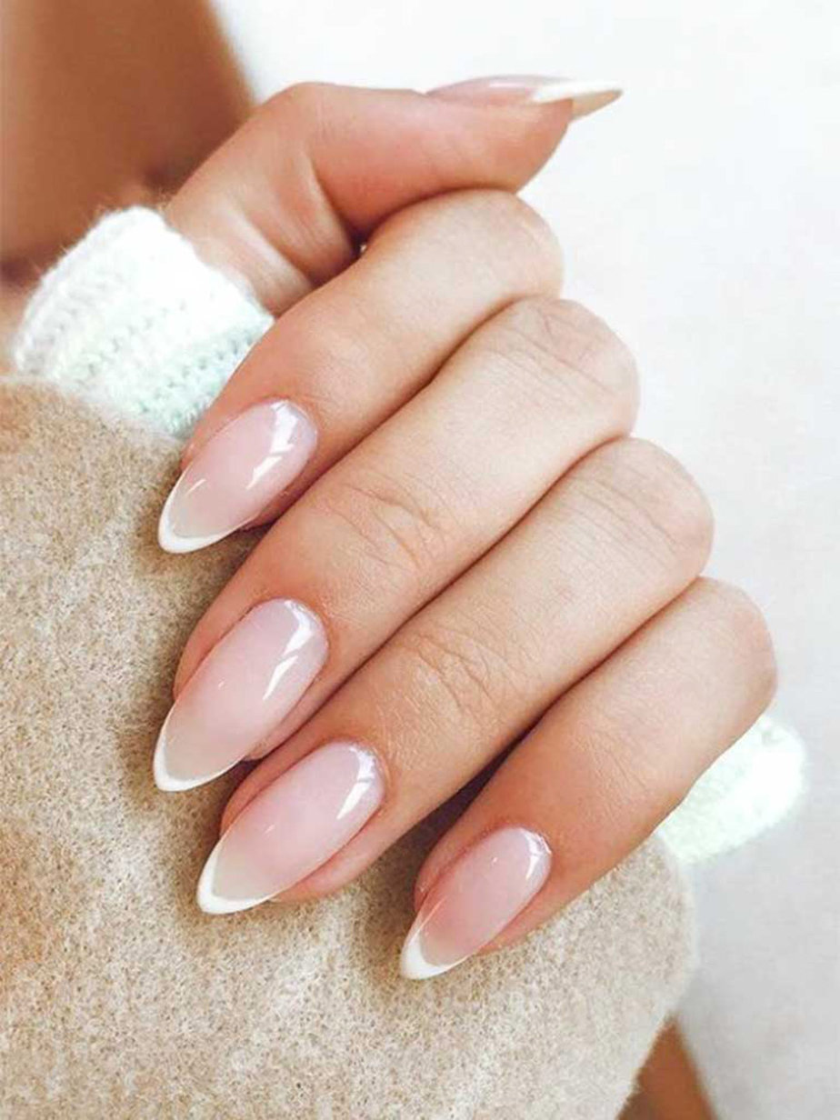 French stilettos with white tips, chic and sophisticated.