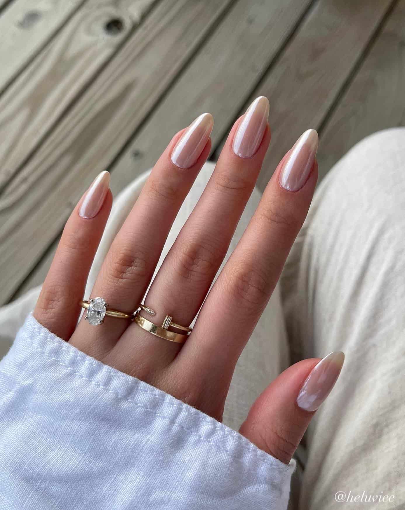 Pearlescent pink nails with a glossy finish