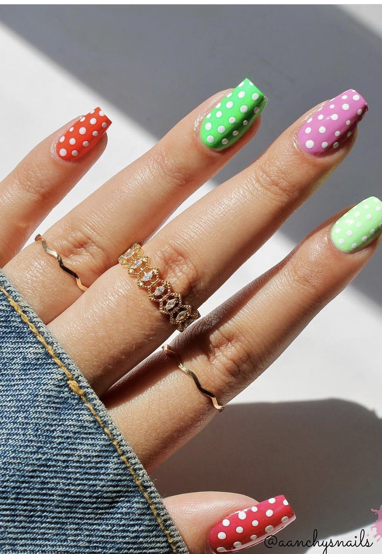 Colorful polka dot nails with a playful vibe