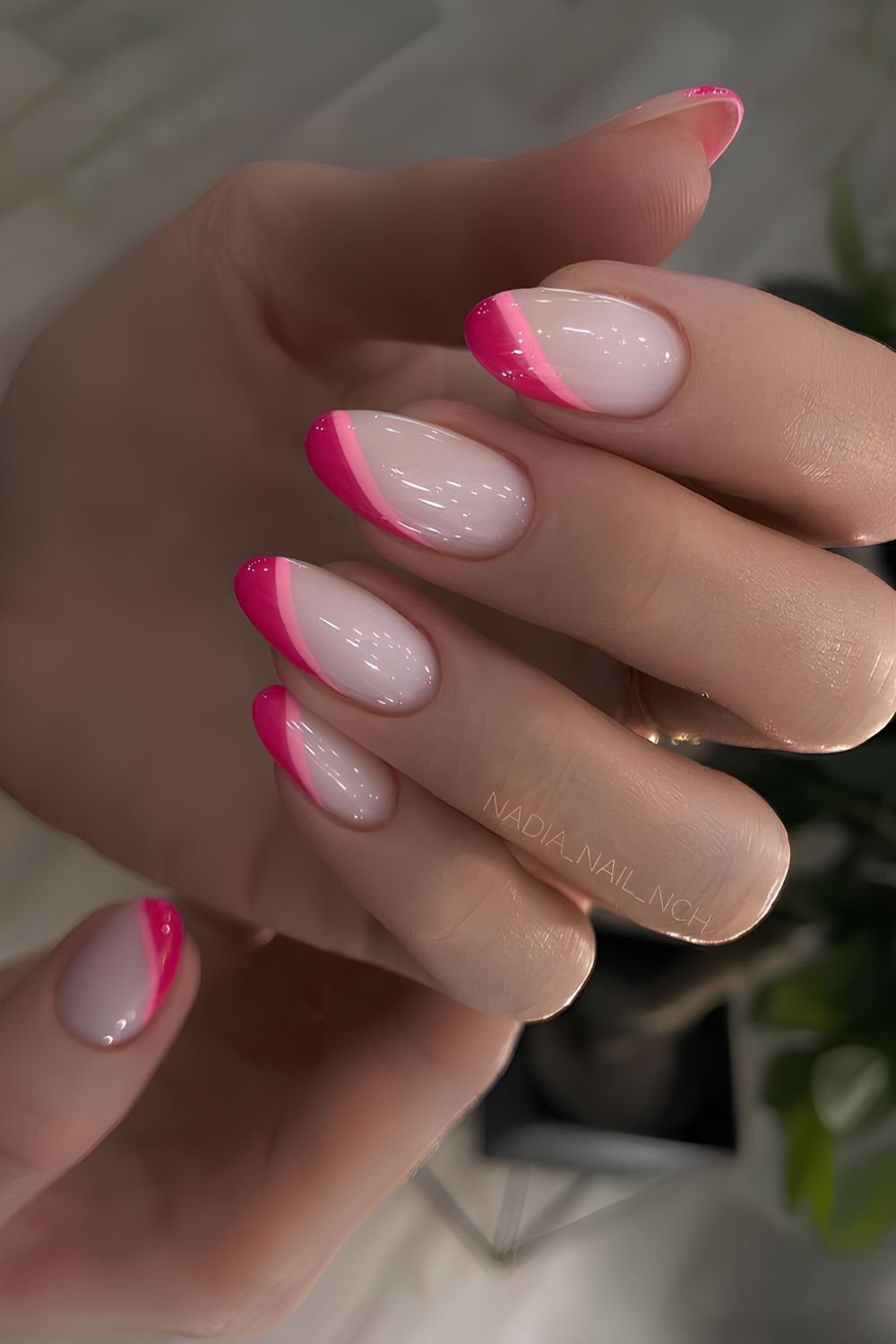 Neon pink French tips on nude base