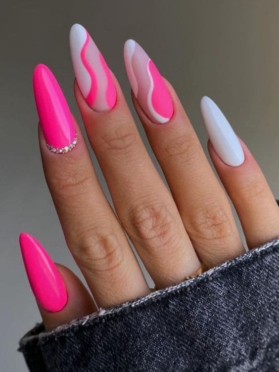 Hot pink and white nails with swirls