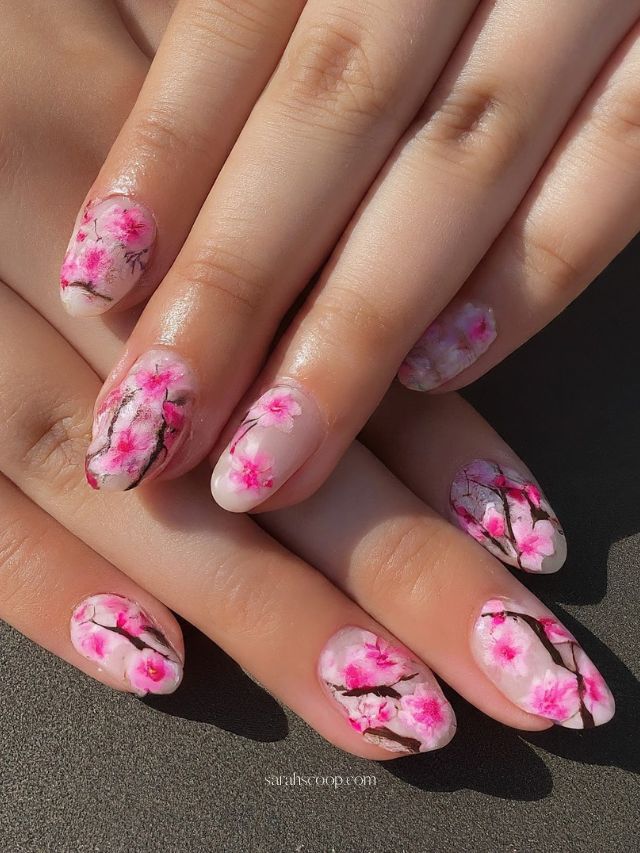 Cherry blossom nail art on nude base
