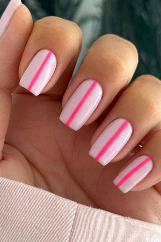 Minimalist nails with pink stripes on nude base