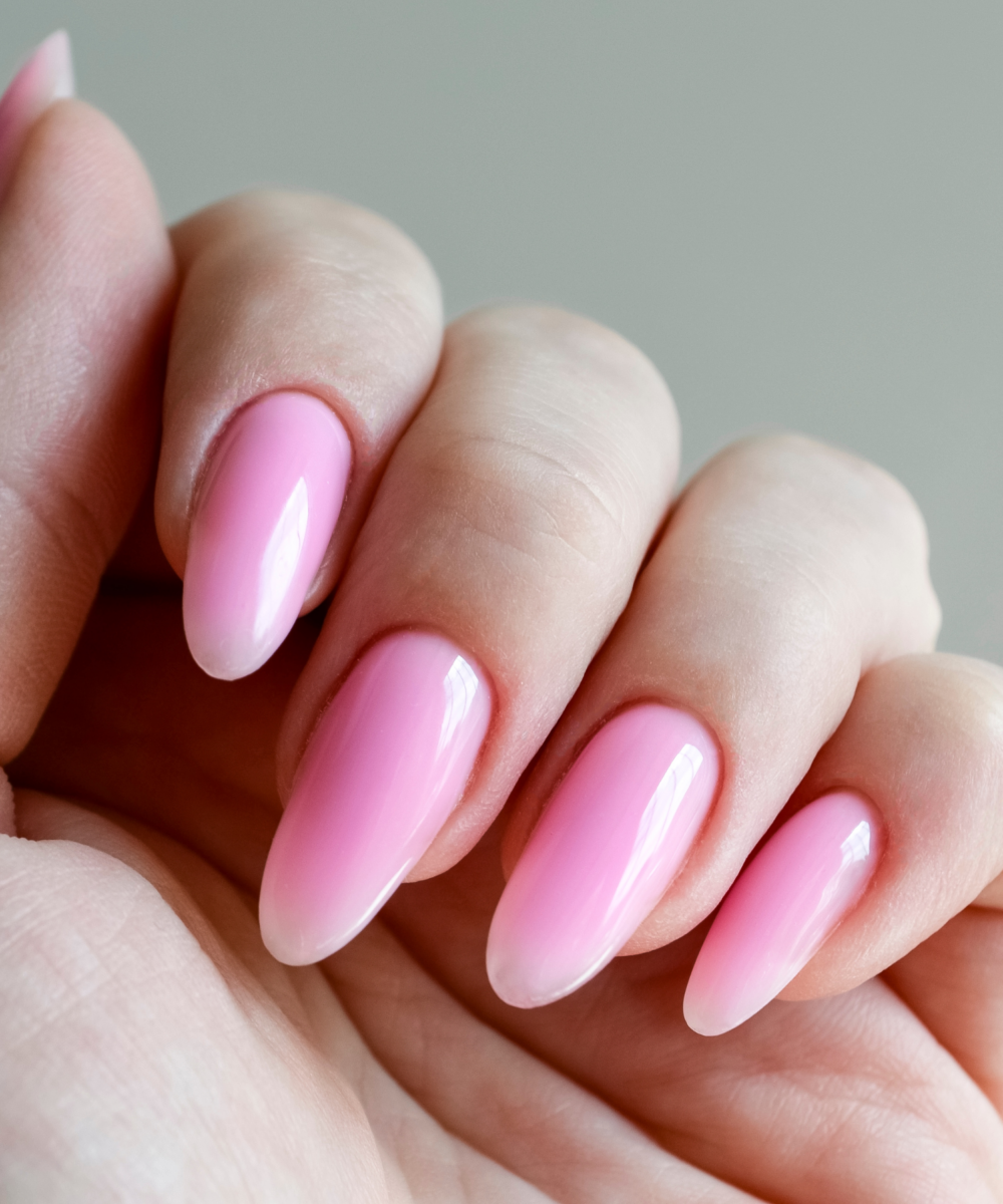 Soft pink ombré nails with glossy finish