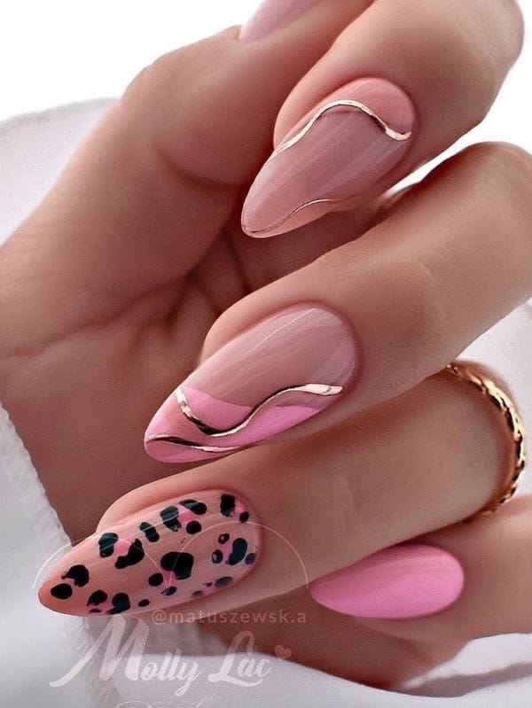 Pink nails with leopard accent, chic design, Pinterest trend
