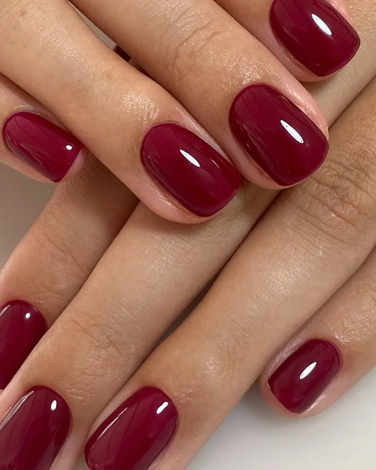 Deep berry nails with a glossy finish, ideal for a sophisticated and bold statement.