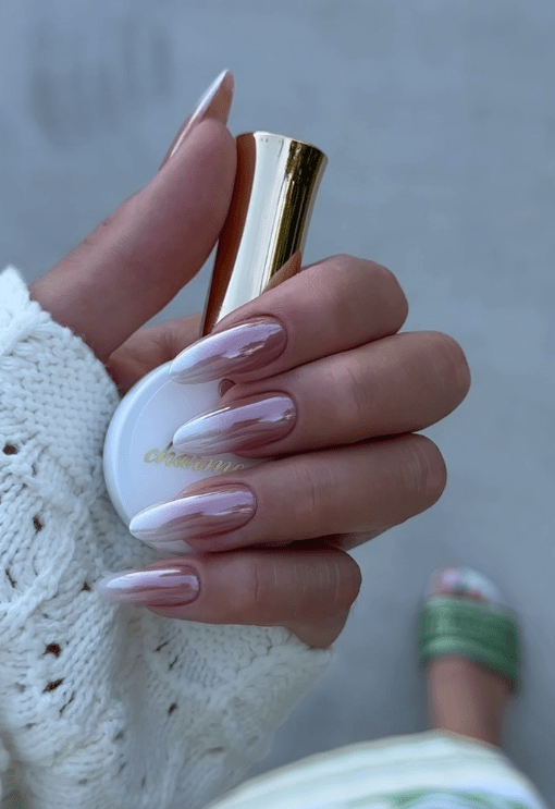 Reimagined French manicure, soft almond shape.