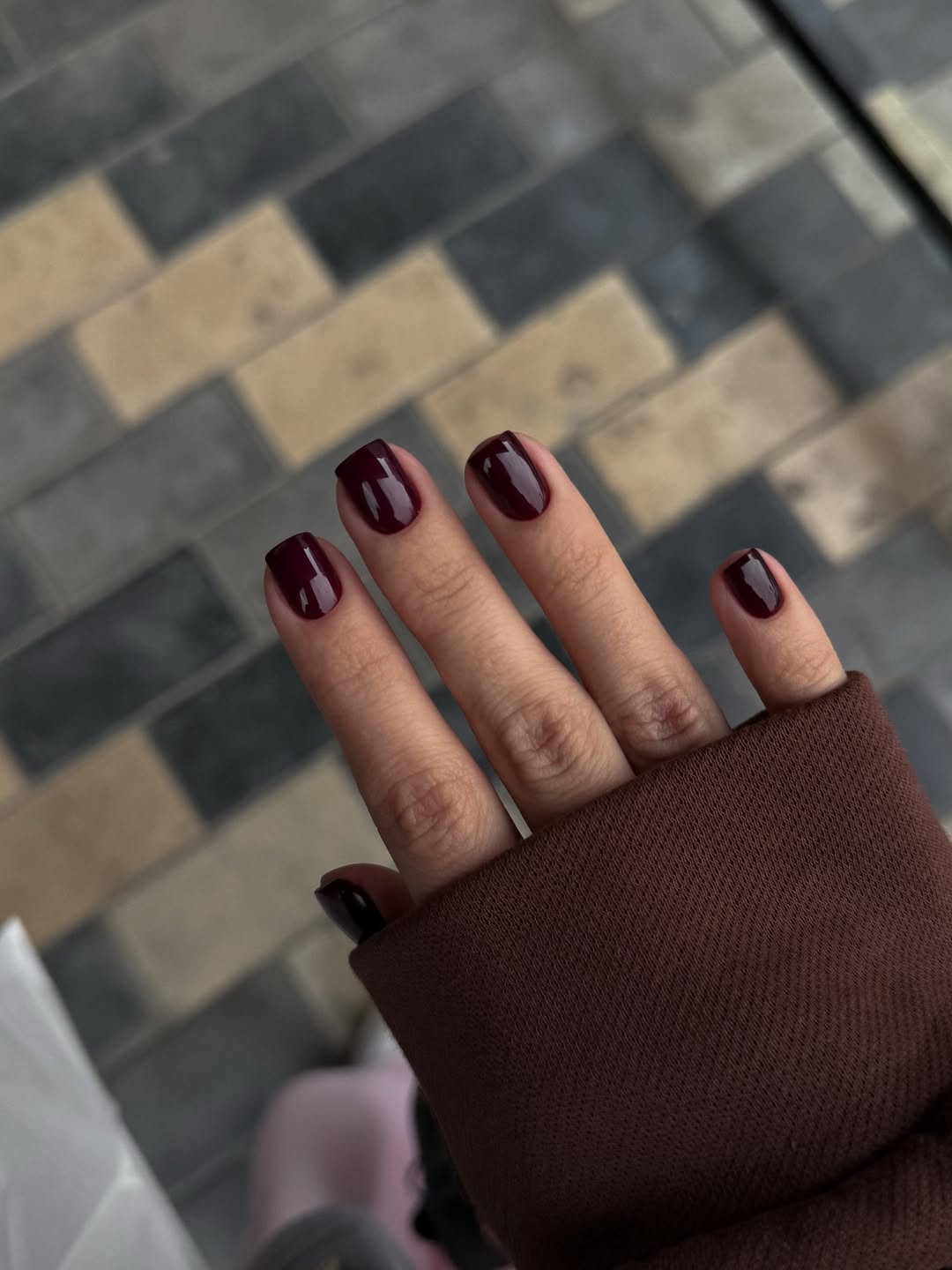 Rich merlot nails, deep elegance.