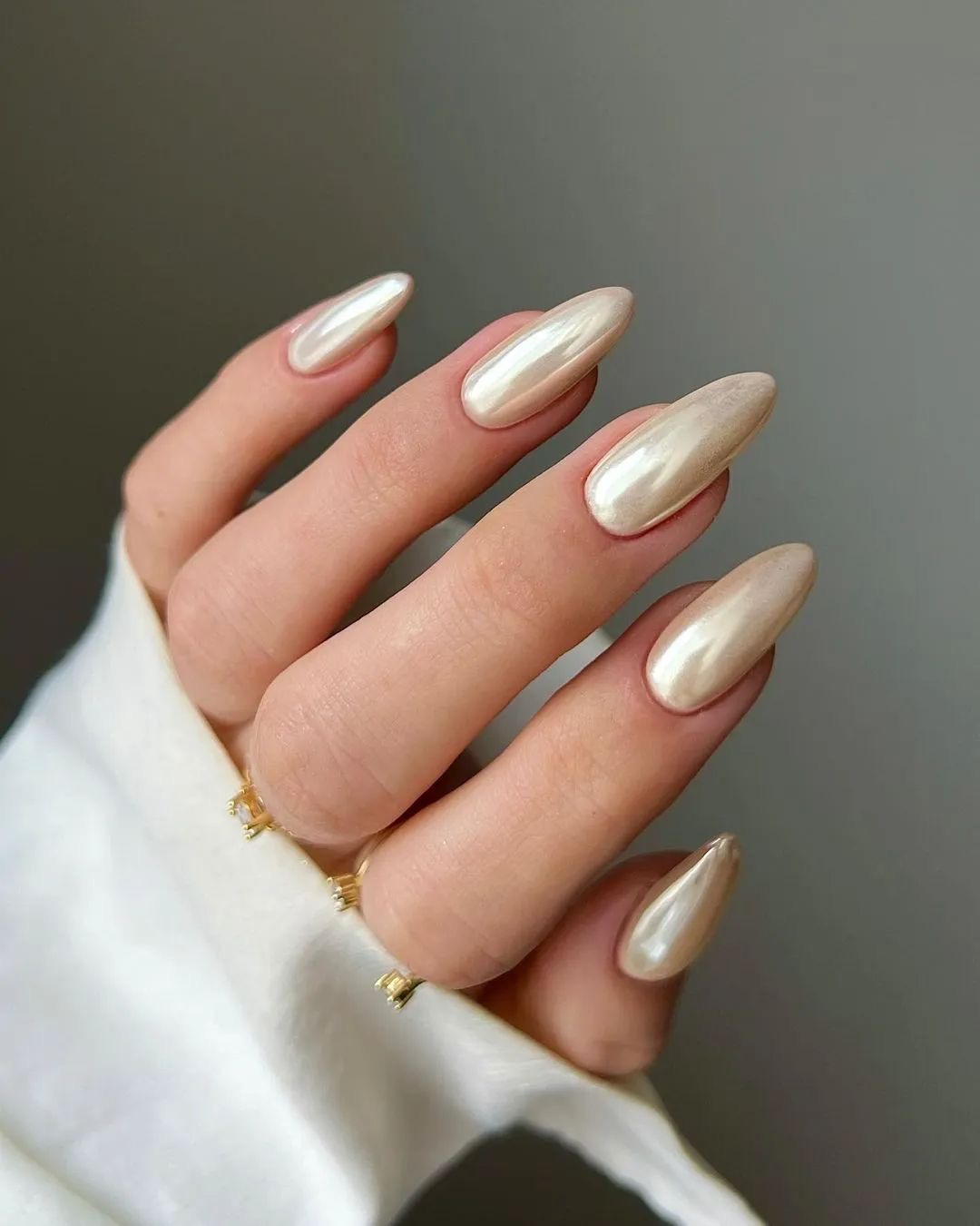 Pearl iridescent nails, Pinterest-inspired elegance.