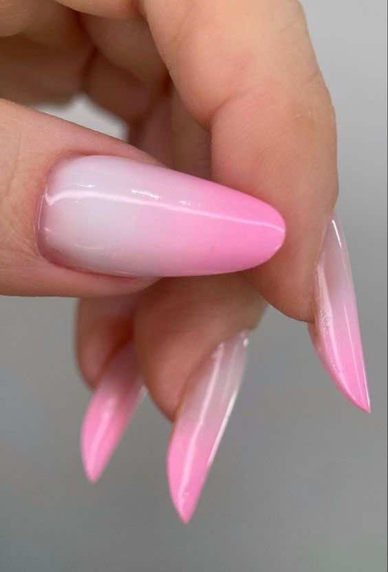 Gradient pink nails with ombre effect, Pinterest elegance.