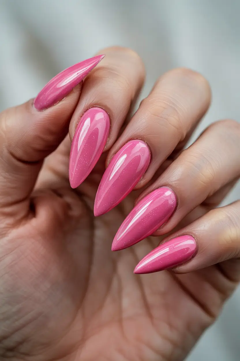 Glossy pink stiletto nails, Pinterest bold.