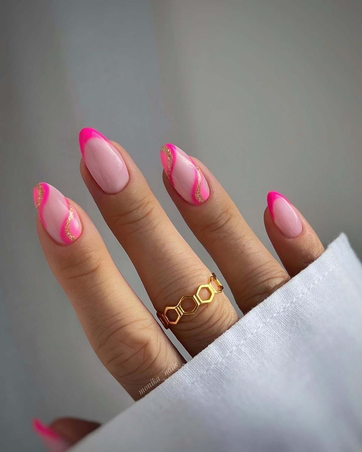 Neon pink wave nails with almond shape.