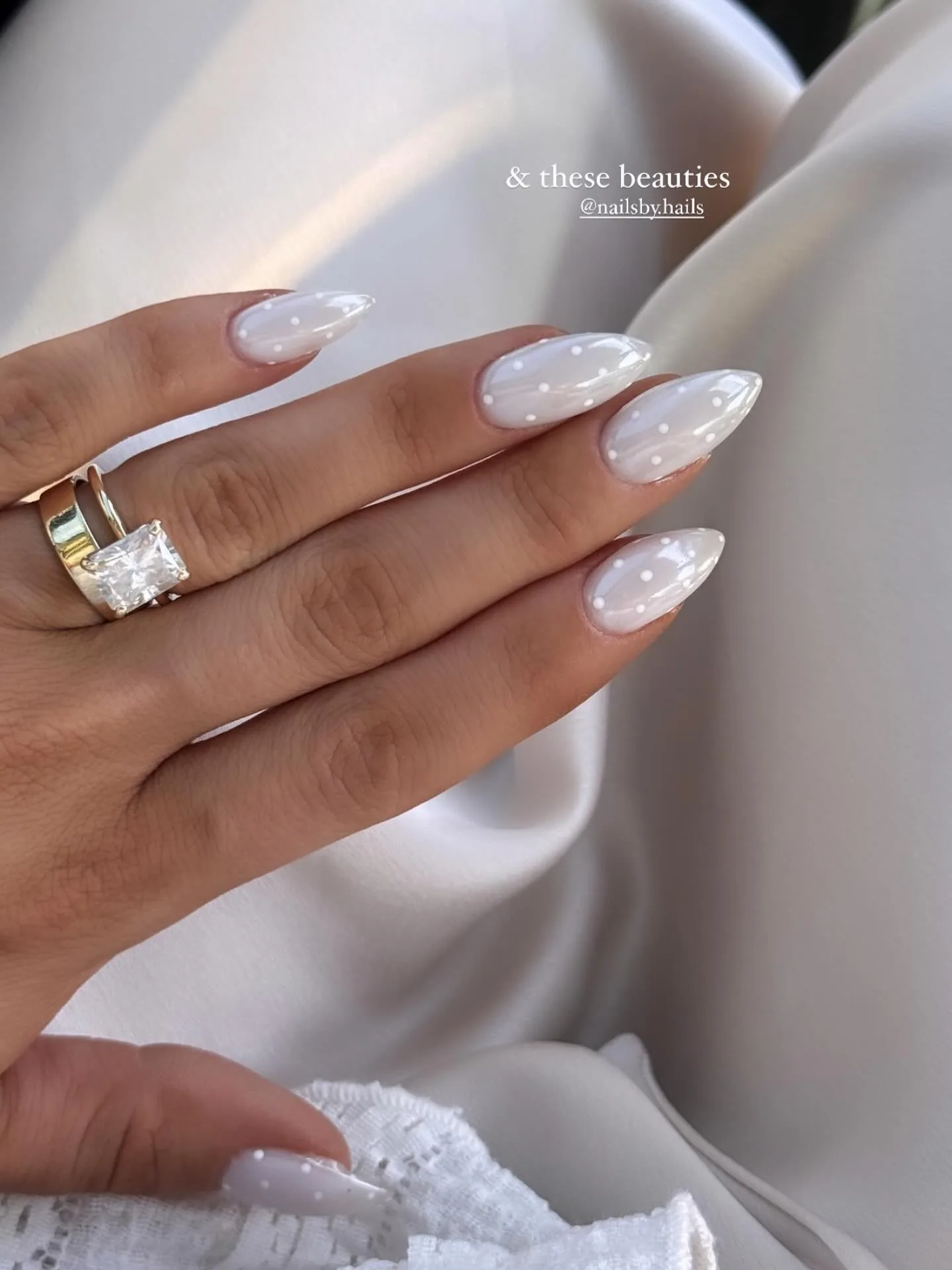 Minimal white polka dots on glossy nails, Pinterest style