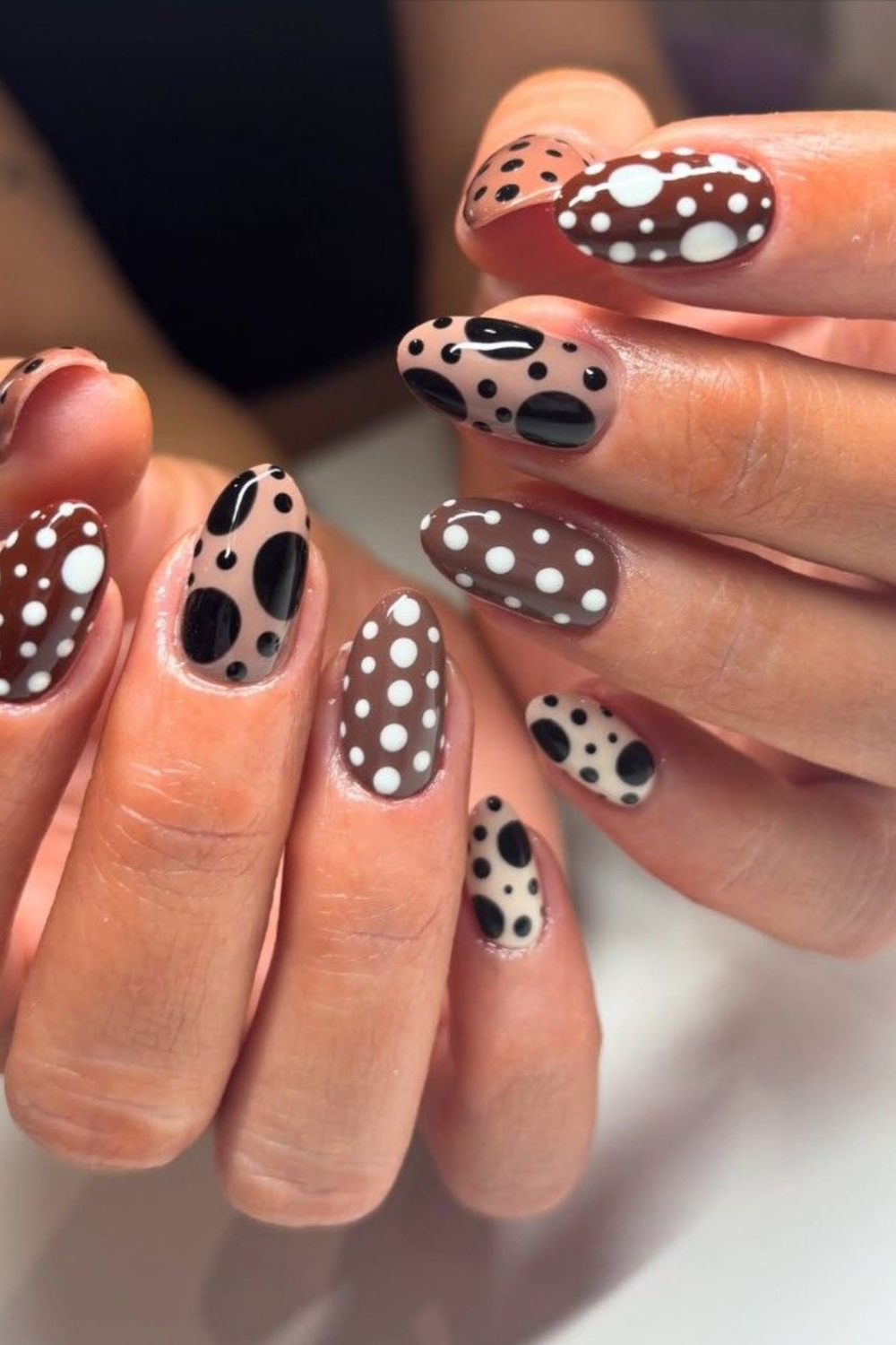 Bold brown and black polka dot nails, Pinterest style