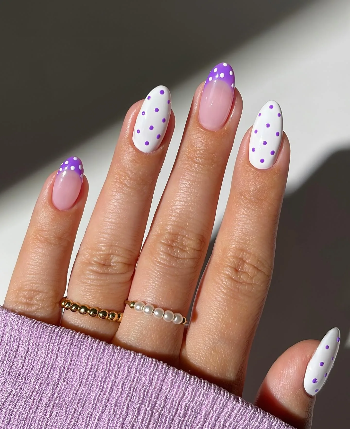 Purple and white polka dot nails