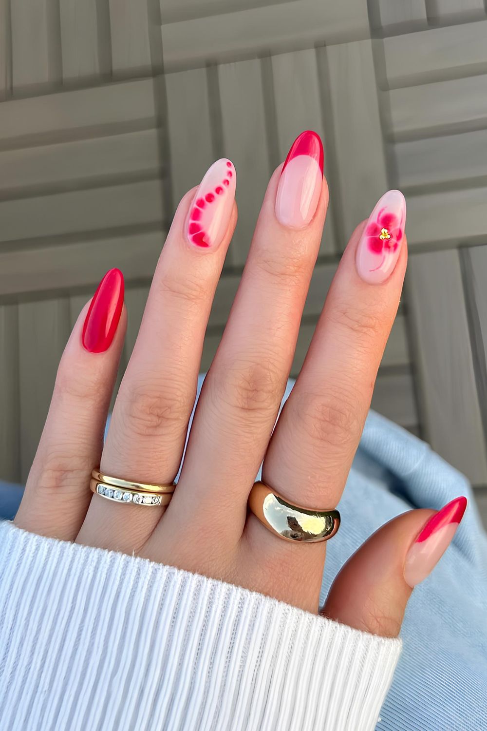 Red French tips with floral accents, Pinterest nail art inspiration.