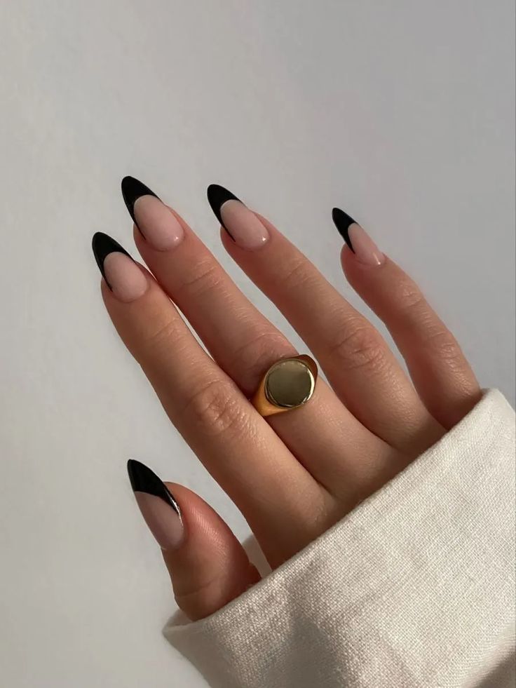 Black French tips on almond nails, Pinterest chic style.