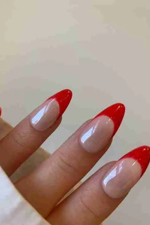 Red almond tips with sheer base, medium length