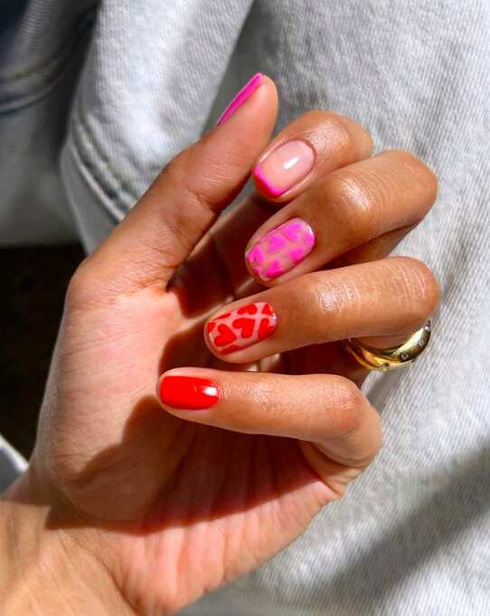 Colorful abstract nails with red accent, short length