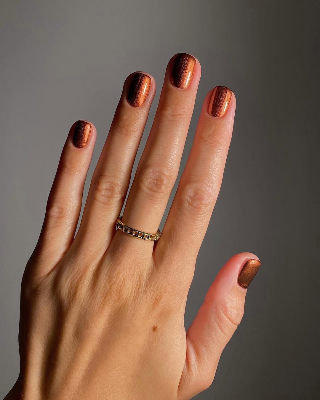 Bronze metallic nails, Pinterest elegant nail trend.