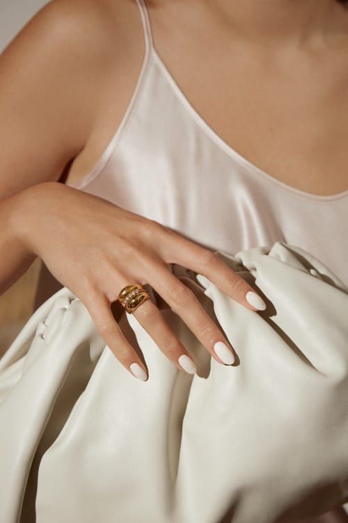 Elegant white nails with short almond shape, chic vibe