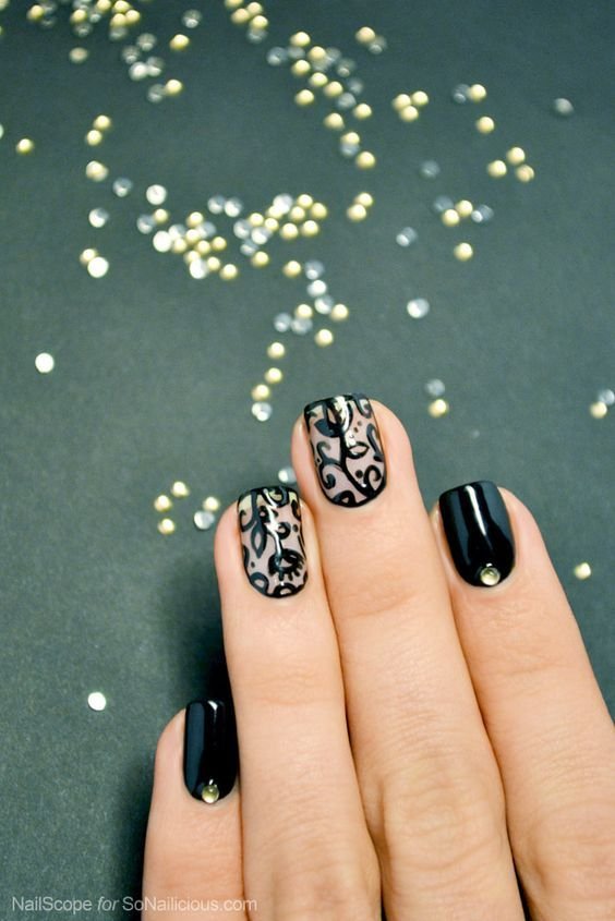 Short square nails with black lace nail art on glossy black base