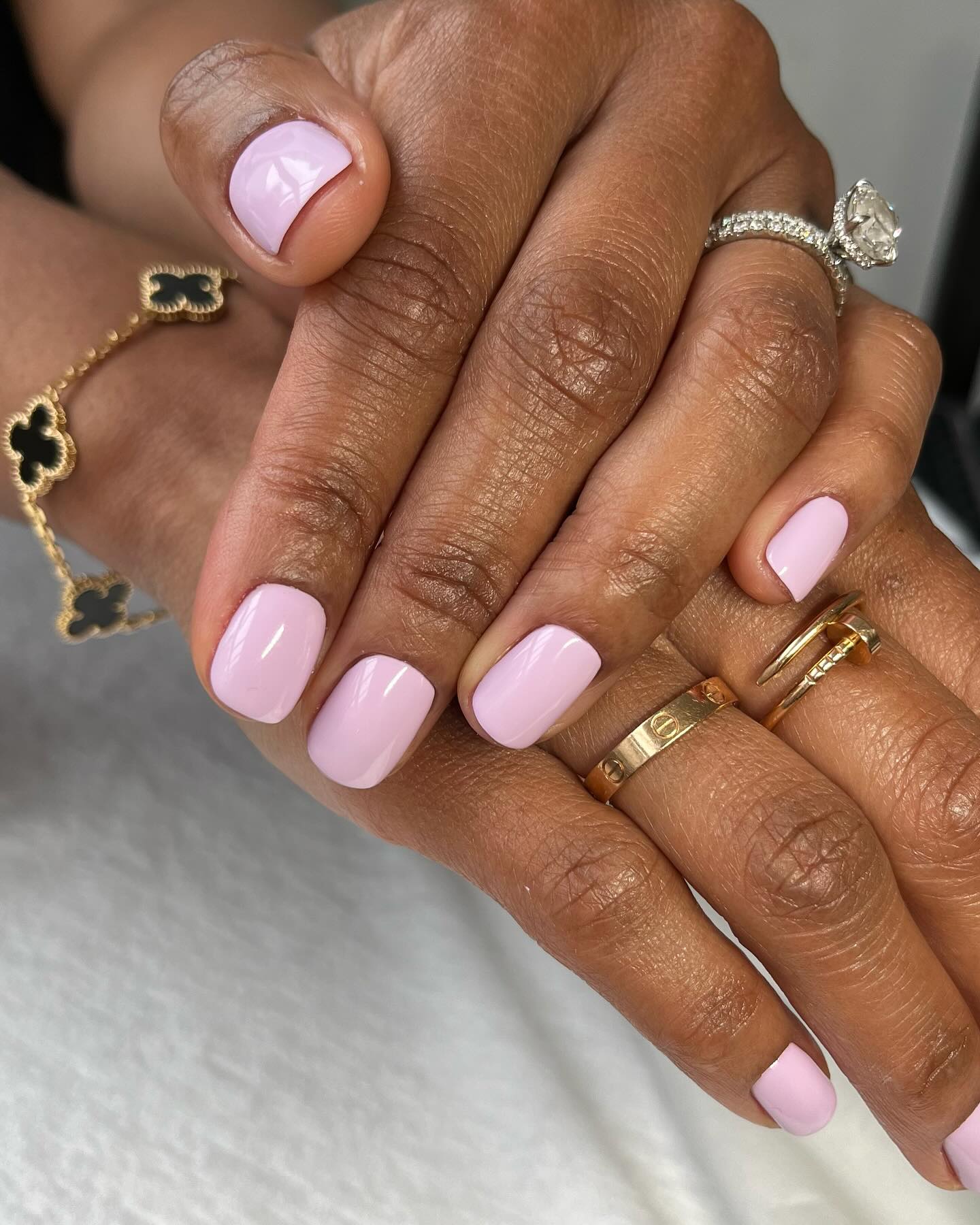 Short square nails with pastel pink polish