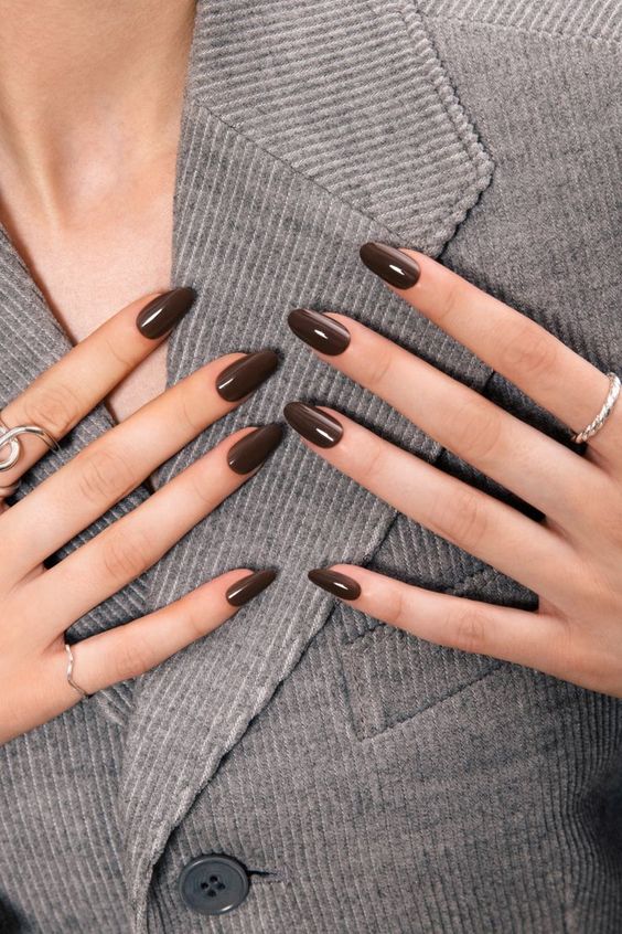 Short almond nails with espresso brown polish
