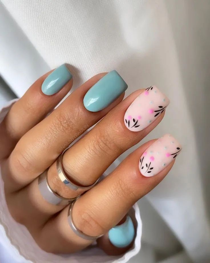 Short square nails with floral and pastel design