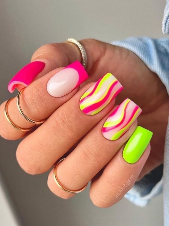 Neon swirl nails with bright colors, summer fun, Pinterest vibrant nails.