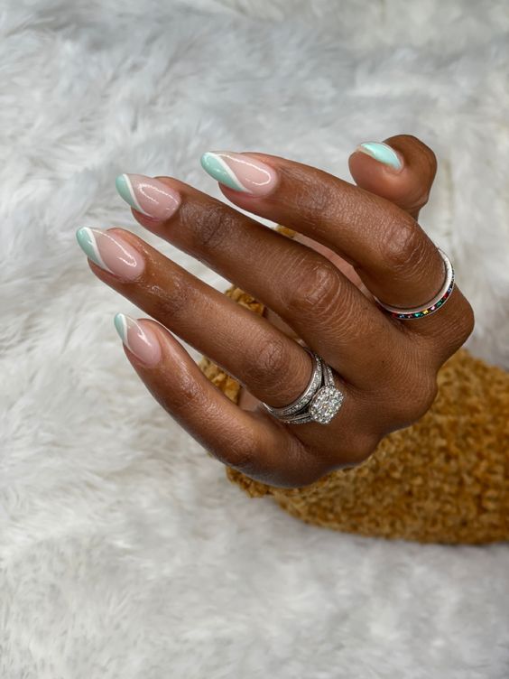 Mint French tips on almond nails, fresh and modern