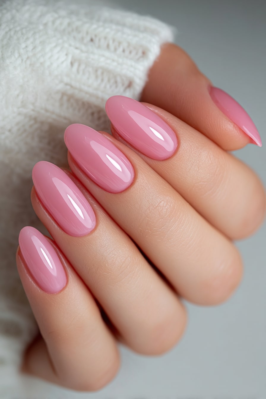 Glossy pink almond nails, feminine and chic