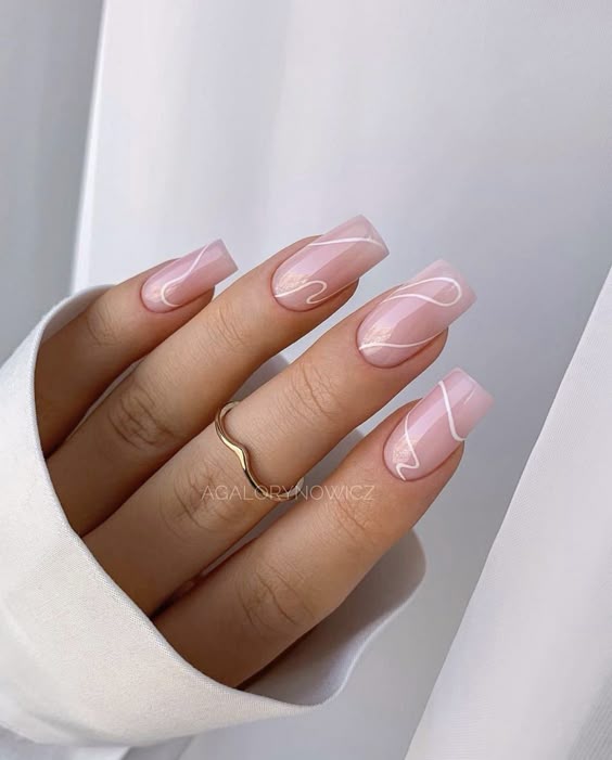 Pink nails with white wave design, chic and feminine