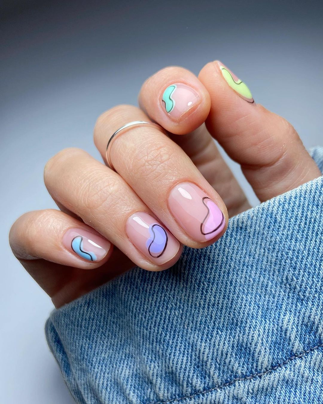 Abstract pastel nails with jelly finish and short shape
