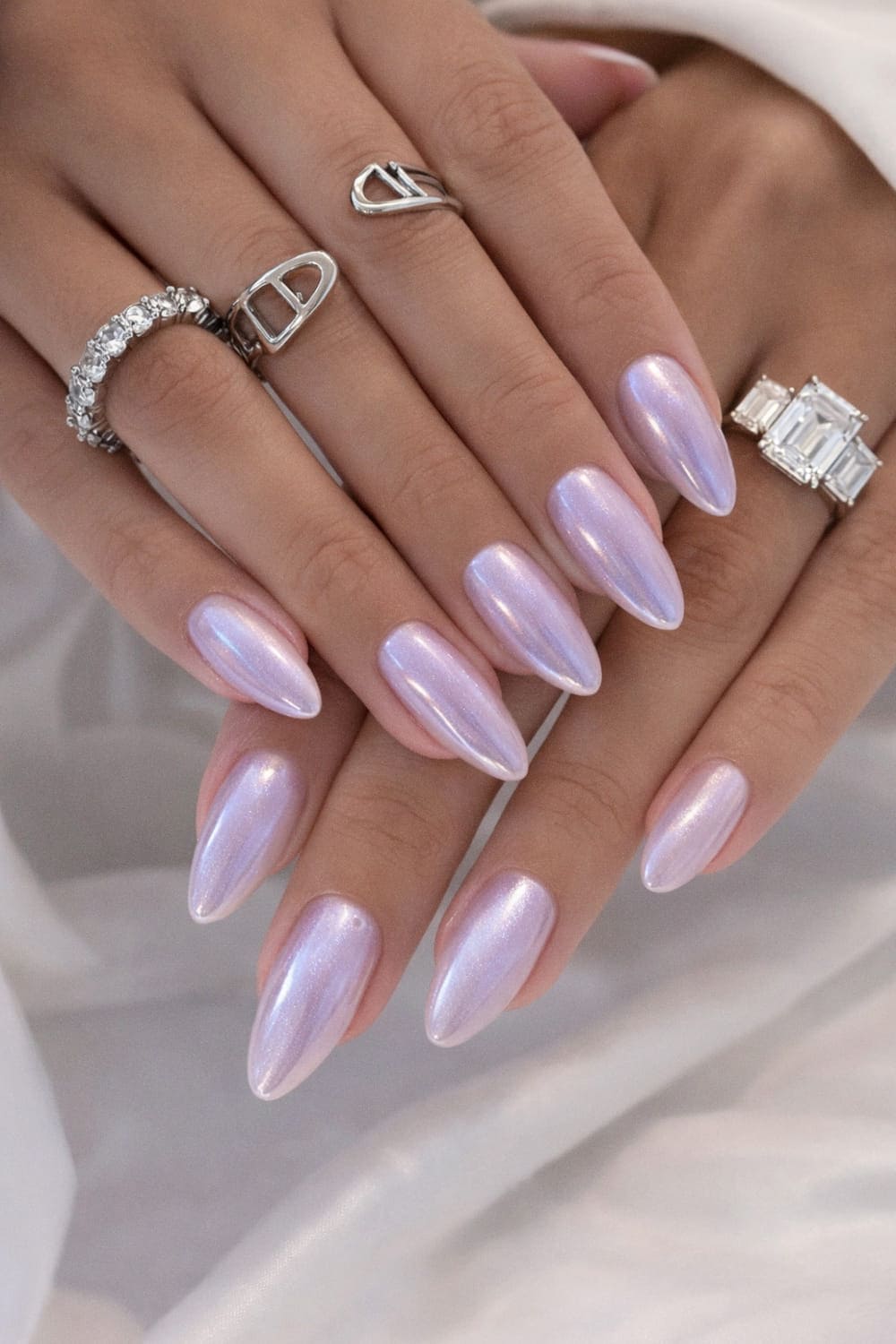 Opalescent French tips on long almond nails