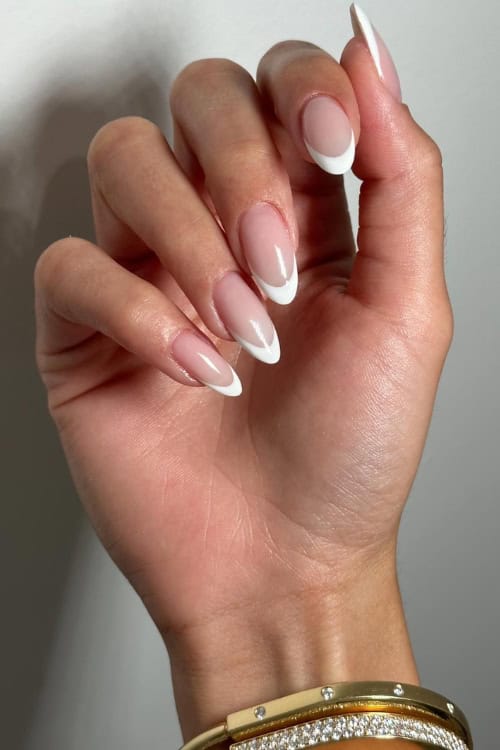 Classic French tips on almond nails