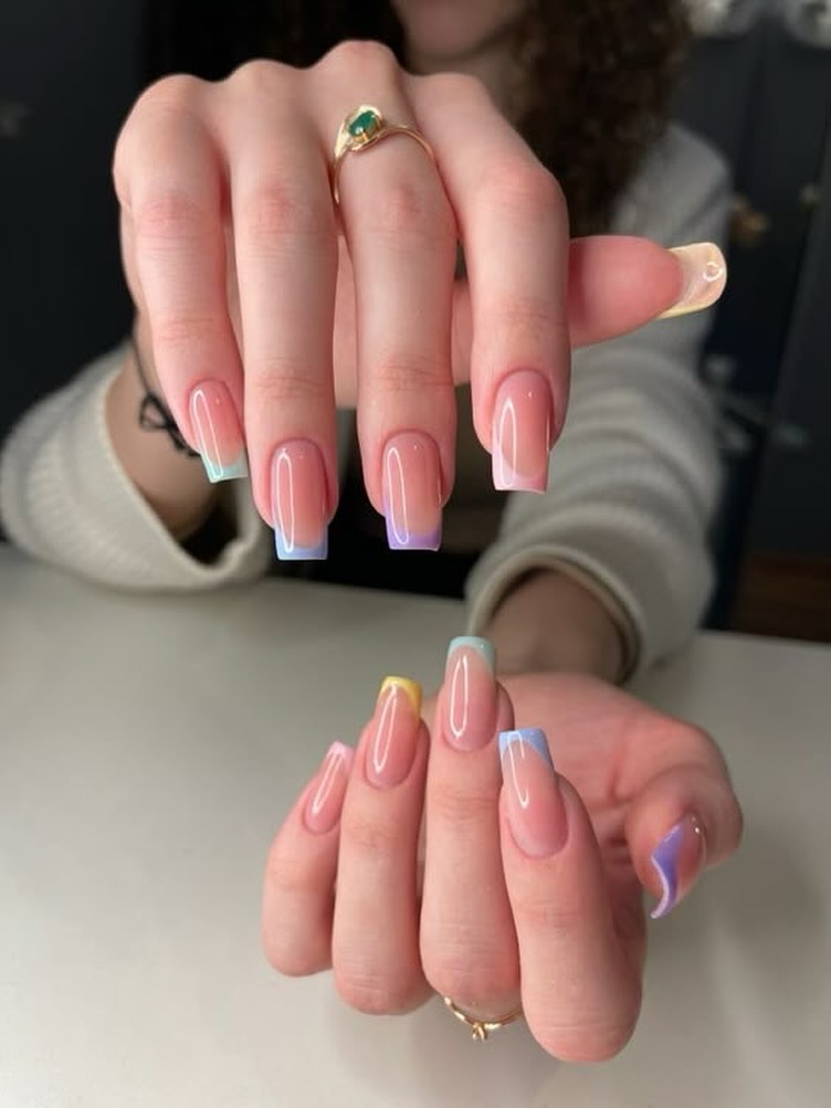 Pastel ombre French tips on medium square nails